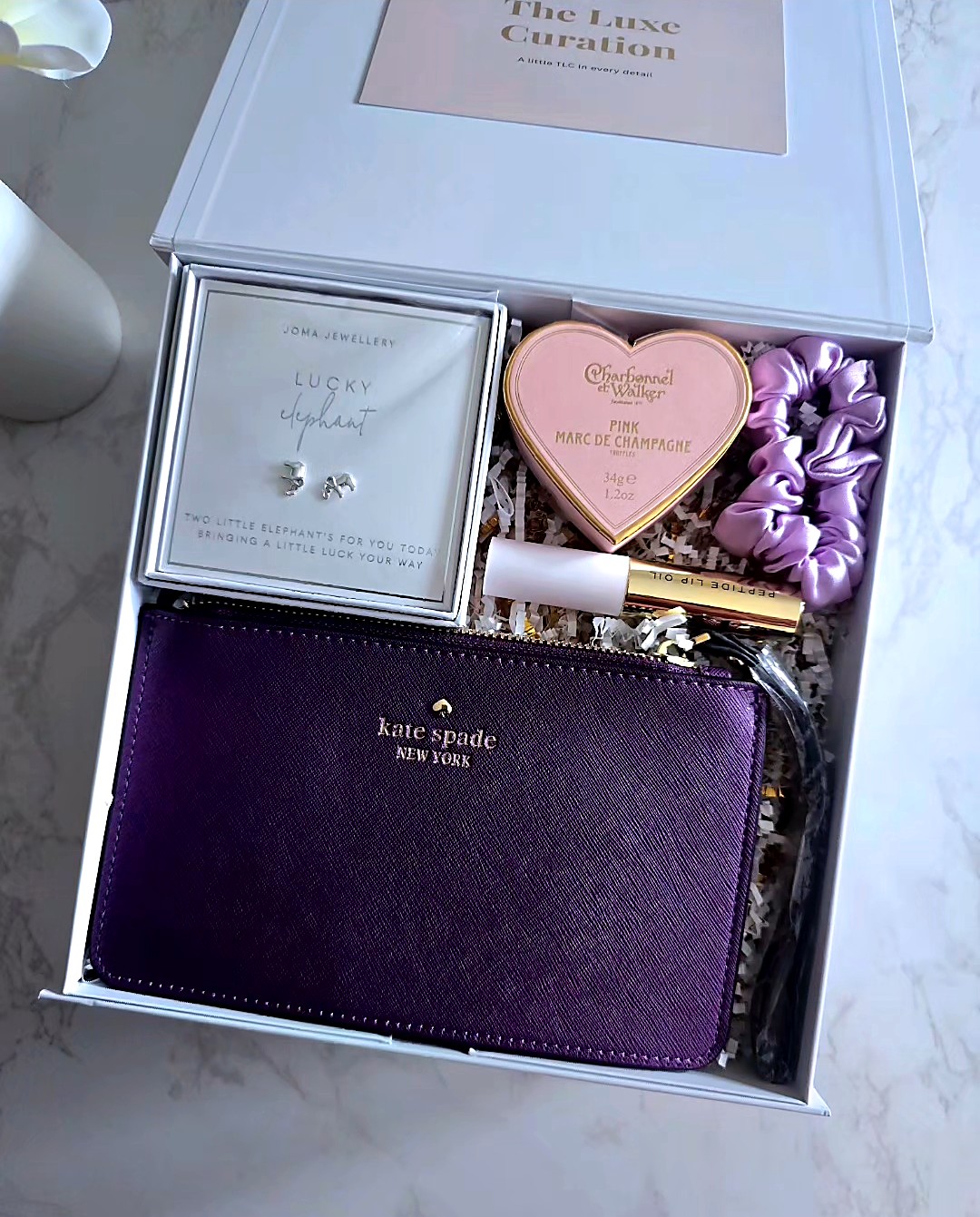 TLC box with Kate Spade pouch and lucky elephant earrings