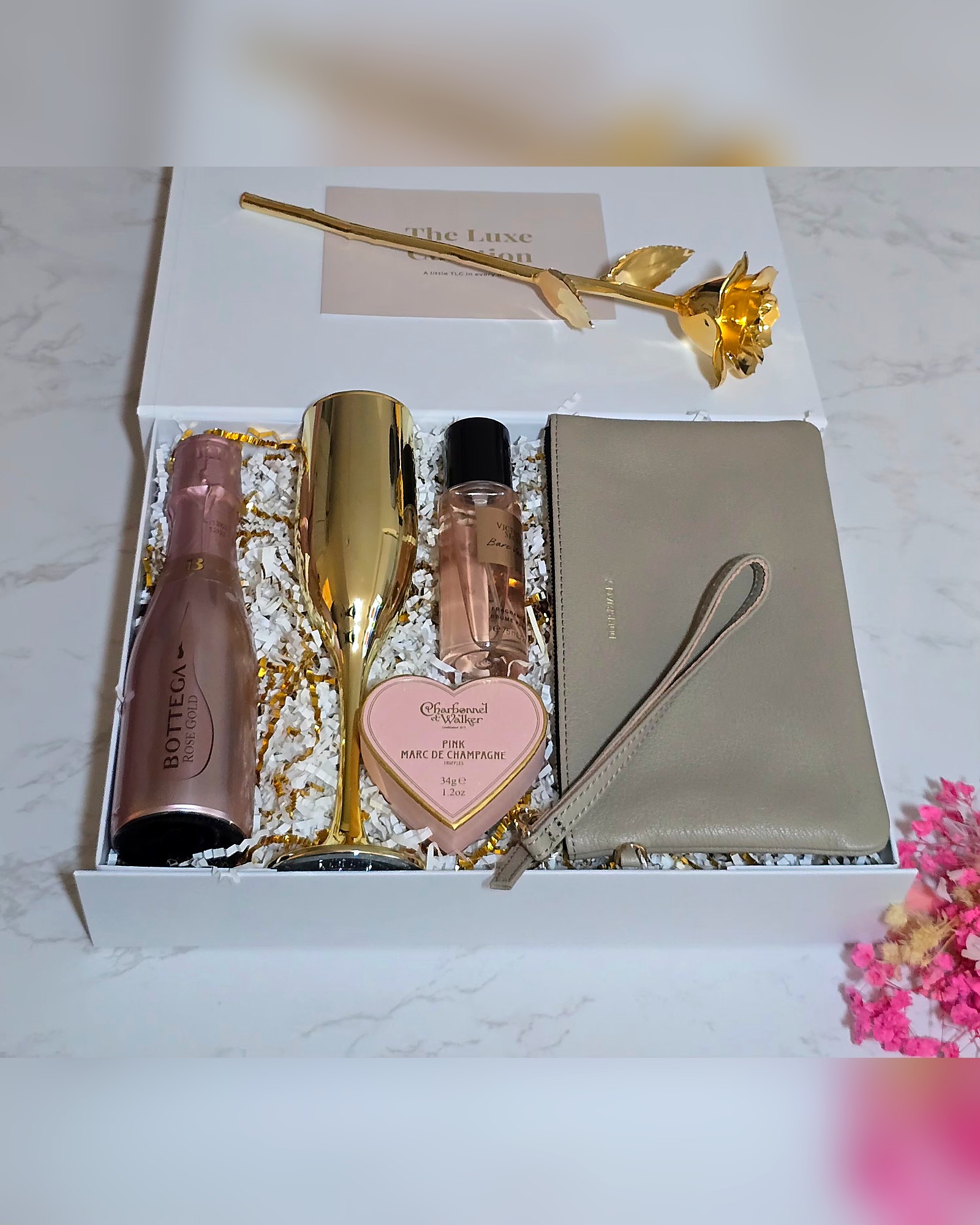 TLC box with rosé, gold flute, gold rose and pouch